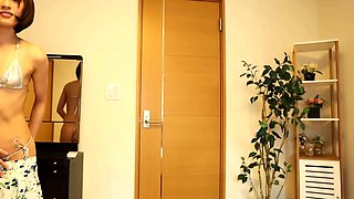 Naughty Japanese babe Ayaka Tomoda masturbates