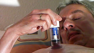 Horny wanking of my oiled cock with suckers on the nipples