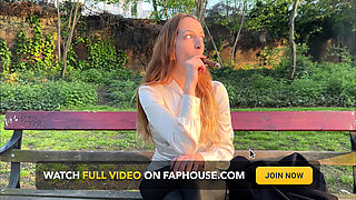 Liz Rainbow Smoking a Flor De Oliva Cigar Outdoors