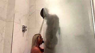 Big tittied blonde rammed by black lover in the shower