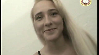 Blonde teen gets bukkake covered in cum in blowbang action