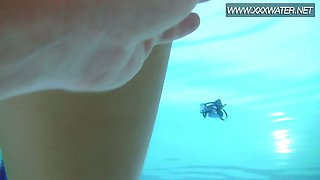 Lusty Hungarian diver with natural tits Minnie Manga masturbates in pool