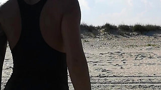 Hot babe teasing on the beach