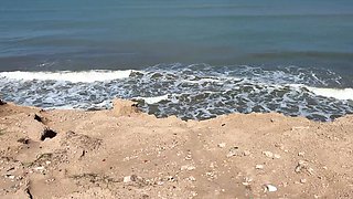 Steamy Encounter with a Naked Beauty on the Beach