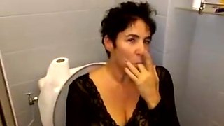 A hot milf  get piss on in toilet