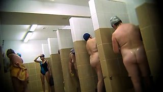 Kinky voyeur spying on amateur Asian ladies taking a shower