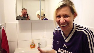 Blonde Sporty MILF Pisses in a Cup Wearing a Sports Jersey, Then Her Man Drinks the Piss