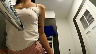 Braless hot brunette skinny and horny babe in a pink mini skirt to show her beautiful ass and legs in the bathroom