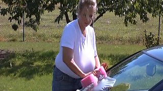 Blonde is flashing her big boobs in the outdoors