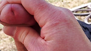 Masturbating in the garden and shooting my load.