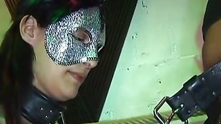 Silver masked German babe fucked in hot BDSM action