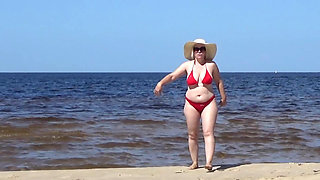 Funny Stepmommy Has Fun on the Beach with Young Guys