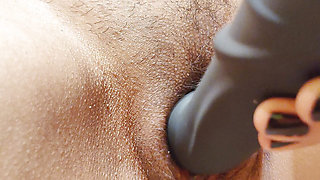 HORNY HOUSEWIFE MASSAGE HER CUTE HAIRY PUSSY WITH HER VIBRATOR