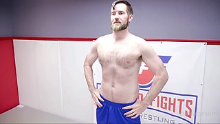 Big cock stud wrestles busty milf down for hot fuck with booty prize