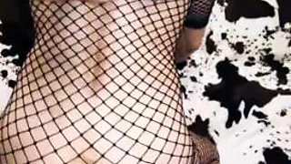 Sexy couple filming video with wife in stockings