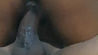 Riding in close up on a huge cock