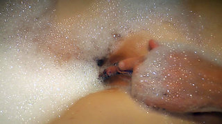 Hot woman gets clit orgasm from water stream in the bathroom