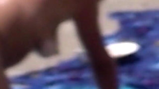 Naked wife on the beach with ass up and doing blowjob is filmed by cuckold