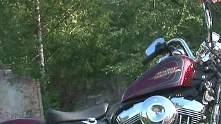 Fabulous brunette enjoys posing outdoors