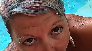 Risky Blowjob at the Swimming Pool in a Resort