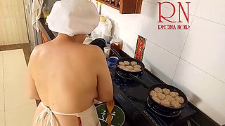 Nudist housewife Regina Noir is cooking in the kitchen