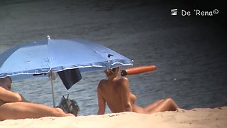 Voyeur webcam catches amateurs nude and half nude on beach