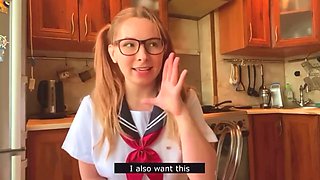 Girl in Japanese school uniform masturbates and reaches orgasm in the kitchen while cosplaying