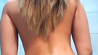 Busty curly brunette with big boobs fucks on couch