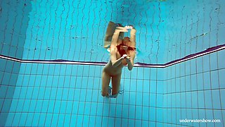 Underwater striptease by sex-appeal swimmer Deniska