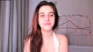 Cute curly brunette solo webcam masturbation