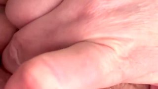 Masturbating