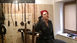 .Goddess Andreea excited her toilet in seethrough catsuit