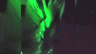 Naughty Brunette in the Dark Room Doing Stripetese