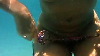 Serbian Cougar Gets Oiled Up