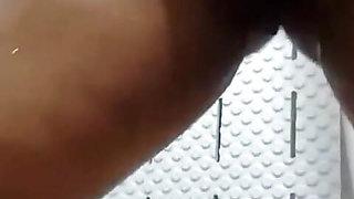 Sexy stepmom takes a shower while cumming in the bathroom