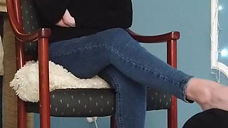 Worshiping the feet of a girl in blue jeans