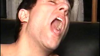 Stud rides strap-on dick after getting dick squeezed