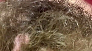 Hairy girl smoking cigarette