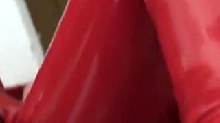 Hot Babe in Red Latex Jumpsuit Pumps Big Guys Cock