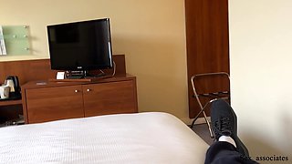 Stepmom shares a bed with her stepson in a hotel and fucks him