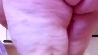 Naked SSBBW cleans lower camera view