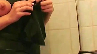 Hot masked babe is having fun with her friend in the bathroom