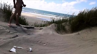 Exhibitionist Strokes Hard on the Beach