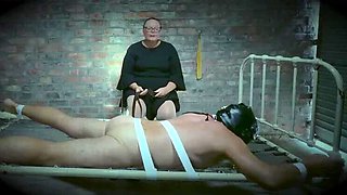 Mistress April Dominates Slave in Cruel BDSM Bed Punishment