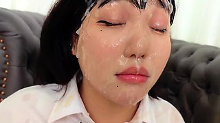 Filthy Asian schoolgirl gets drenched in cum bukkake style