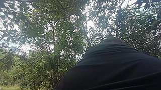 Slutty Latina in the Forest Exposing Her Ass in a Dress and Thongs