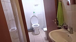 Teen girl went to dormitory toilet to pee and masturbate.
