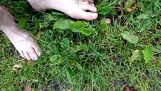 In long Zivalco Rubberboots and barefoot on Street and River