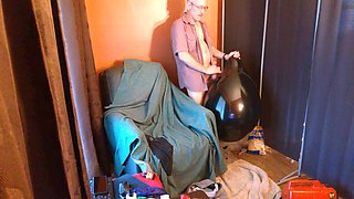 Stepdad gets off solo while teasing a big round balloon and aims to pop it