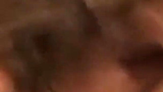 Gucurly Haired Brunette Washes Sins Away with Gloryhole Cum